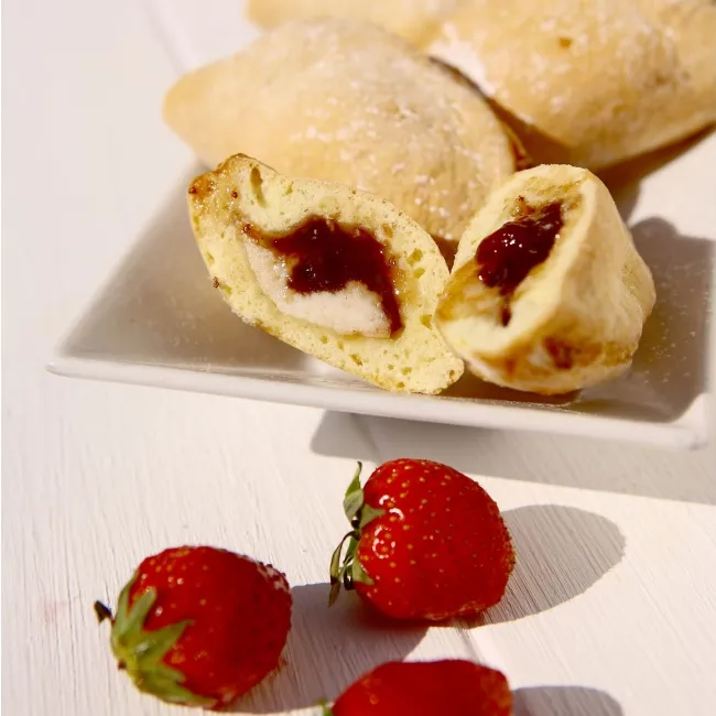 Ricette - Fiadoni con ricotta con confettura extra di fragole